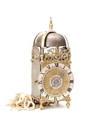 Lot 77 - NICHOLAS COXETER, LONDINI. A MID 17TH CENTURY BRASS VERGE LANTERN CLOCK