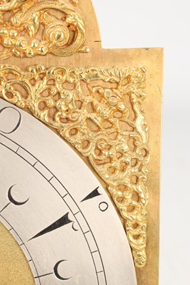 Lot 65 - GEORGE CLARKE, LONDON. AN EARLY 18TH CENTURY BRASS ARCHED DIAL LANTERN CLOCK