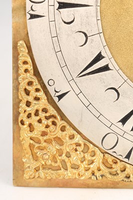 Lot 65 - GEORGE CLARKE, LONDON. AN EARLY 18TH CENTURY BRASS ARCHED DIAL LANTERN CLOCK
