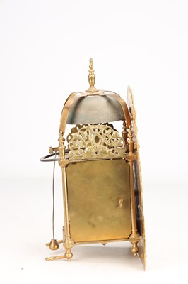 Lot 65 - GEORGE CLARKE, LONDON. AN EARLY 18TH CENTURY BRASS ARCHED DIAL LANTERN CLOCK