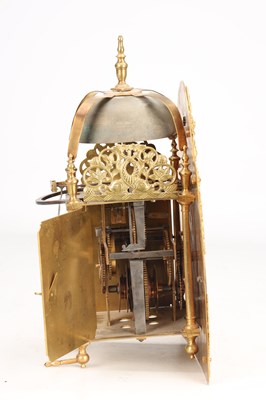 Lot 65 - GEORGE CLARKE, LONDON. AN EARLY 18TH CENTURY BRASS ARCHED DIAL LANTERN CLOCK
