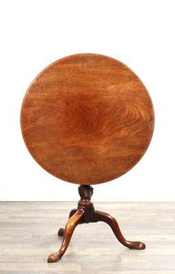 Lot A GEORGE III FIGURED MAHOGANY TILT-TOP TRIPOD TABLE