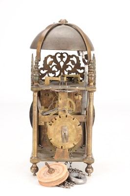 Lot 97 - WILLIAM SPEAKMAN, LONDON A LATE 17TH CENTURY BRASS VERGE STRIKING LANTERN CLOCK