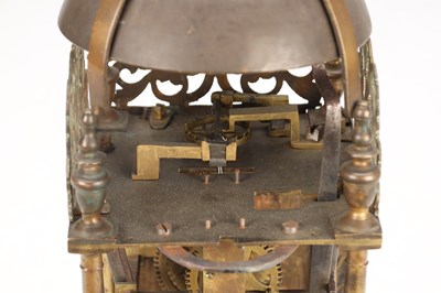 Lot 97 - WILLIAM SPEAKMAN, LONDON A LATE 17TH CENTURY BRASS VERGE STRIKING LANTERN CLOCK