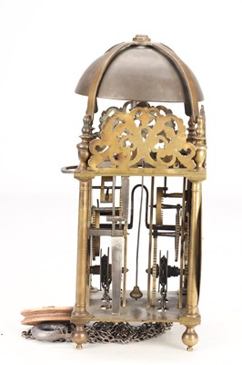 Lot 97 - WILLIAM SPEAKMAN, LONDON A LATE 17TH CENTURY BRASS VERGE STRIKING LANTERN CLOCK