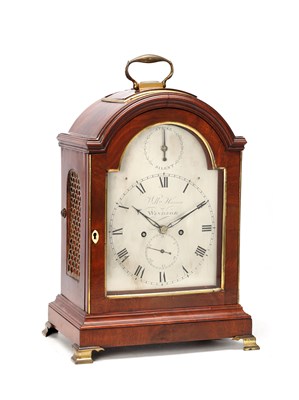 Lot 63 - WILLIAM HANSON OF WINDSOR. A GEORGE III FIGURED MAHOGANY PAD TOP BRACKET CLOCK