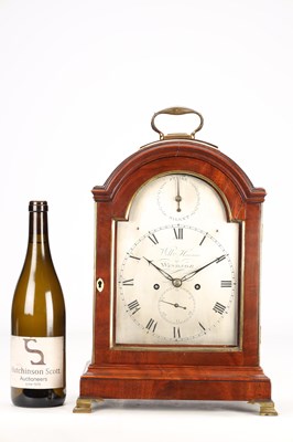Lot 63 - WILLIAM HANSON OF WINDSOR. A GEORGE III FIGURED MAHOGANY PAD TOP BRACKET CLOCK