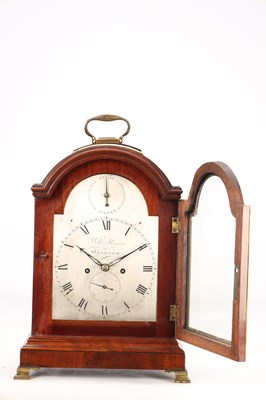 Lot 63 - WILLIAM HANSON OF WINDSOR. A GEORGE III FIGURED MAHOGANY PAD TOP BRACKET CLOCK