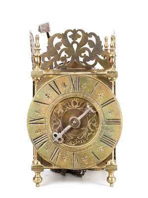 Lot AN EARLY 18TH CENTURY BRASS LANTERN CLOCK