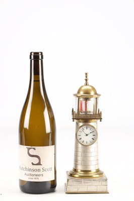 Lot 118 - GUILMET, PARIS. A LATE 19TH CENTURY BRASS AND SILVERED METAL AUTOMATON LIGHTHOUSE MANTEL CLOCK