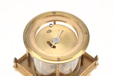 Lot 118 - GUILMET, PARIS. A LATE 19TH CENTURY BRASS AND SILVERED METAL AUTOMATON LIGHTHOUSE MANTEL CLOCK