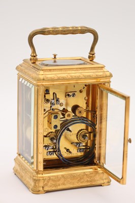 Lot 55 - DROCOURT, PARIS. A LATE 19TH CENTURY GORGE CASED GILT BRASS ENGRAVED AND ENAMELLED REPEATING CARRIAGE CLOCK