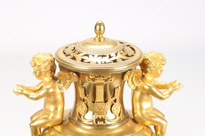 Lot 70 - AN EARLY 19TH CENTURY FRENCH ORMOLU URN-FORM MANTEL CLOCK WITH PUTTI MOUNTS