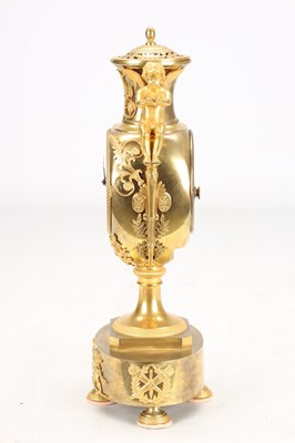 Lot 70 - AN EARLY 19TH CENTURY FRENCH ORMOLU URN-FORM MANTEL CLOCK WITH PUTTI MOUNTS