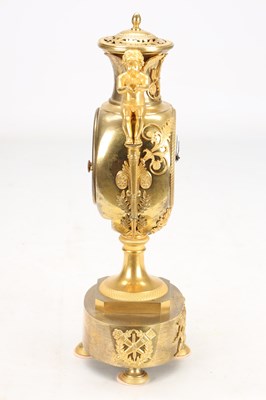Lot 70 - AN EARLY 19TH CENTURY FRENCH ORMOLU URN-FORM MANTEL CLOCK WITH PUTTI MOUNTS