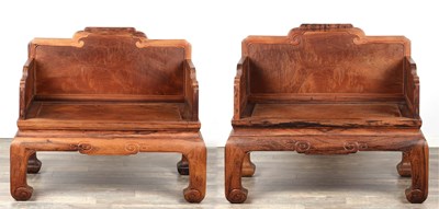 Lot A PAIR OF 20TH CENTURY CHINESE HARDWOOD SETTEES