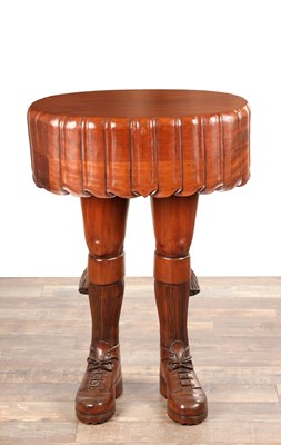 Lot A LATE 20TH CENTURY HARDWOOD SCOTSMAN KILT TABLE