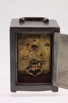 Lot 14 - ARCHIBALD KNOX FOR LIBERTY & CO. A "TUDRIC" PEWTER AND ENAMEL CARRIAGE CLOCK