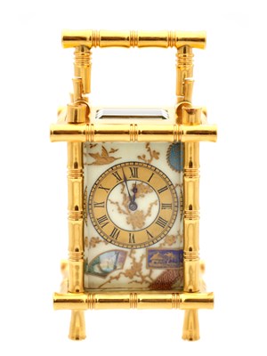 Lot 23 - A LATE 19TH CENTURY FRENCH MINIATURE GILT BRASS AND PORCELAIN PANELLED CARRIAGE CLOCK