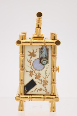Lot 23 - A LATE 19TH CENTURY FRENCH MINIATURE GILT BRASS AND PORCELAIN PANELLED CARRIAGE CLOCK