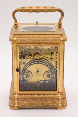 Lot 38 - DROCOURT, PARIS. A RARE LATE 19TH CENTURY GIANT GILT ENGRAVED GORGE CASED REPEATING CARRIAGE CLOCK WITH PORCELAIN PANELS