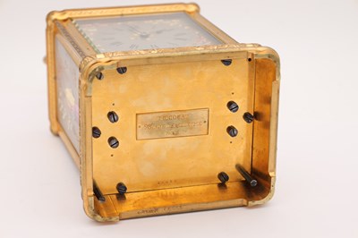 Lot 38 - DROCOURT, PARIS. A RARE LATE 19TH CENTURY GIANT GILT ENGRAVED GORGE CASED REPEATING CARRIAGE CLOCK WITH PORCELAIN PANELS