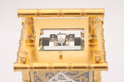 Lot 57 - HENRI JACOT A LATE 19TH CENTURY FRENCH GILT BRASS BRONZE AND MIXED METAL REPEATING CARRIAGE CLOCK