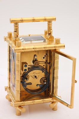 Lot 57 - HENRI JACOT A LATE 19TH CENTURY FRENCH GILT BRASS BRONZE AND MIXED METAL REPEATING CARRIAGE CLOCK