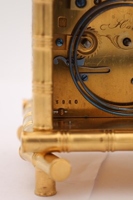 Lot 57 - HENRI JACOT A LATE 19TH CENTURY FRENCH GILT BRASS BRONZE AND MIXED METAL REPEATING CARRIAGE CLOCK