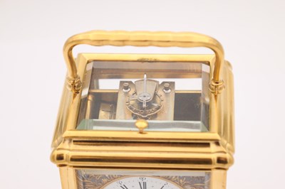 Lot 28 - ARSENE MARGAINE, PARIS. A LATE 19TH CENTURY FRENCH GORGE CASED BRONZE AND MIXED METAL REPEATING CARRIAGE CLOCK
