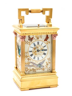 Lot 53 - AN UNUSUAL LATE 19TH CENTURY FRENCH PORCELAIN AND RAISED JEWELLED PANELLED REPEATING CARRIAGE CLOCK