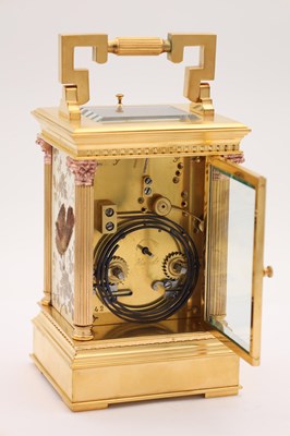 Lot 53 - AN UNUSUAL LATE 19TH CENTURY FRENCH PORCELAIN AND RAISED JEWELLED PANELLED REPEATING CARRIAGE CLOCK
