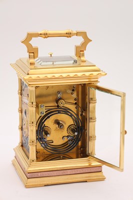 Lot 54 - A FINE LATE 19TH CENTURY FRENCH REPEATING CARRIAGE CLOCK WITH BRONZE AND GILT HIGHLIGHTED ORIENTALIST PANELS