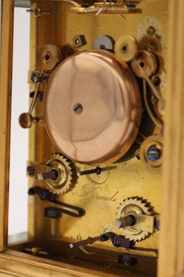 Lot 191 - RAINGO A PARIS A MID-19TH CENTURY GILT ONE-PIECE CASE GRAND SONNERIE CARRIAGE CLOCK