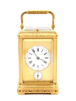 Lot 35 - A LATE 19TH CENTURY FRENCH GILT ENGRAVED ENAMEL AND PORCELAIN REPEATING CARRIAGE CLOCK