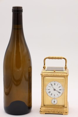 Lot 35 - A LATE 19TH CENTURY FRENCH GILT ENGRAVED ENAMEL AND PORCELAIN REPEATING CARRIAGE CLOCK