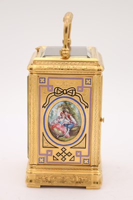 Lot 35 - A LATE 19TH CENTURY FRENCH GILT ENGRAVED ENAMEL AND PORCELAIN REPEATING CARRIAGE CLOCK