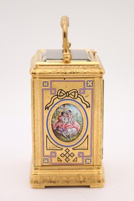 Lot 35 - A LATE 19TH CENTURY FRENCH GILT ENGRAVED ENAMEL AND PORCELAIN REPEATING CARRIAGE CLOCK