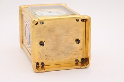 Lot 35 - A LATE 19TH CENTURY FRENCH GILT ENGRAVED ENAMEL AND PORCELAIN REPEATING CARRIAGE CLOCK