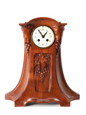 Lot A FRENCH ART NOUVEAU CARVED MAHOGANY MANTEL CLOCK