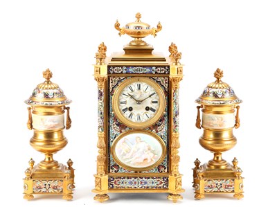 Lot 74 - A GOOD QUALITY LATE 19TH CENTURY FRENCH GILT CASED CHAMPLEVE ENAMEL AND PORCELAIN PANELLED CLOCK GARNITURE