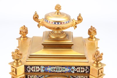Lot 74 - A GOOD QUALITY LATE 19TH CENTURY FRENCH GILT CASED CHAMPLEVE ENAMEL AND PORCELAIN PANELLED CLOCK GARNITURE