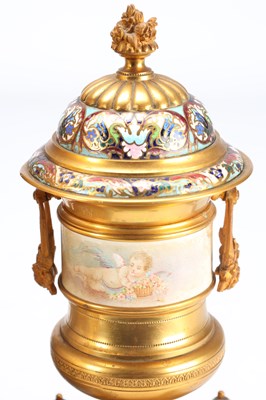 Lot 74 - A GOOD QUALITY LATE 19TH CENTURY FRENCH GILT CASED CHAMPLEVE ENAMEL AND PORCELAIN PANELLED CLOCK GARNITURE