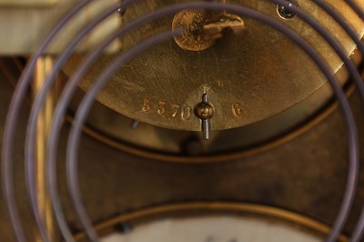 Lot 74 - A GOOD QUALITY LATE 19TH CENTURY FRENCH GILT CASED CHAMPLEVE ENAMEL AND PORCELAIN PANELLED CLOCK GARNITURE