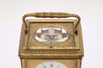Lot 105 - DROCOURT PARIS, A LATE 19TH CENTURY FRENCH ENGRAVED GILT BRASS GORGE CASE REPEATING CARRIAGE CLOCK