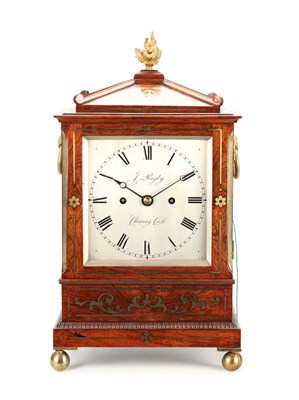 Lot 52 - JAMES RIGBY, CHARING CROSS. A SMALL REGENCY BRASS INLAID ROSEWOOD STRIKING BRACKET CLOCK