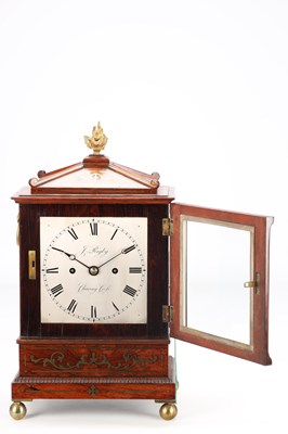 Lot 52 - JAMES RIGBY, CHARING CROSS. A SMALL REGENCY BRASS INLAID ROSEWOOD STRIKING BRACKET CLOCK