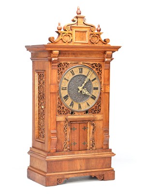 Lot 156 - A MID 19TH CENTURY BLACK FOREST WALNUT TRUMPETER CLOCK