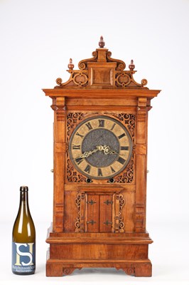 Lot 156 - A MID 19TH CENTURY BLACK FOREST WALNUT TRUMPETER CLOCK
