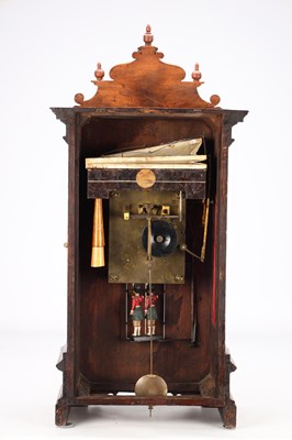 Lot 156 - A MID 19TH CENTURY BLACK FOREST WALNUT TRUMPETER CLOCK